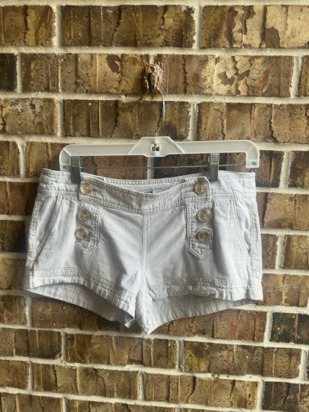 Express White Denim Shorts with Decorative Buttons